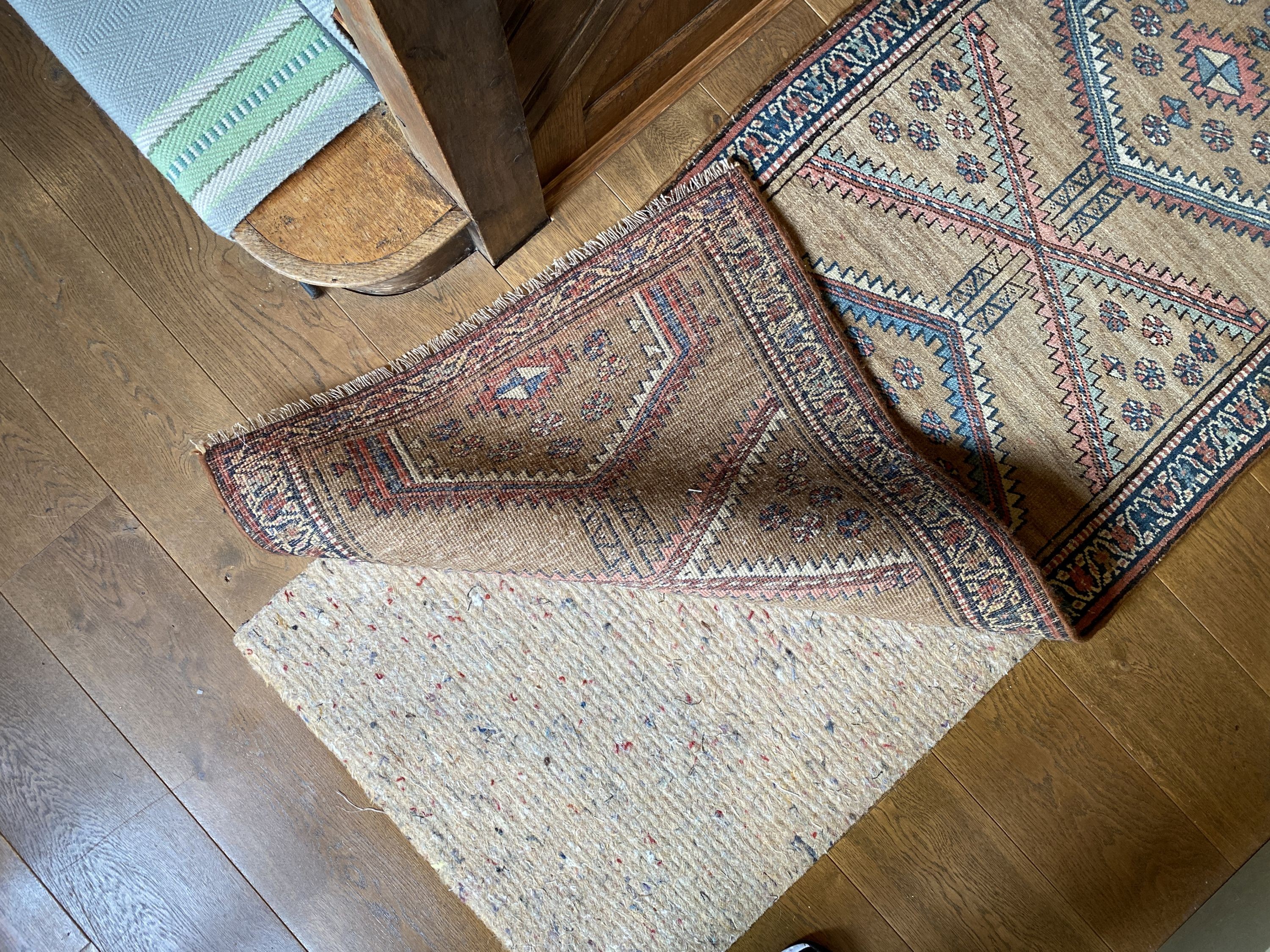 A Caucasian style pale brown ground runner, with hexagonal motifs, 382 x 77cm